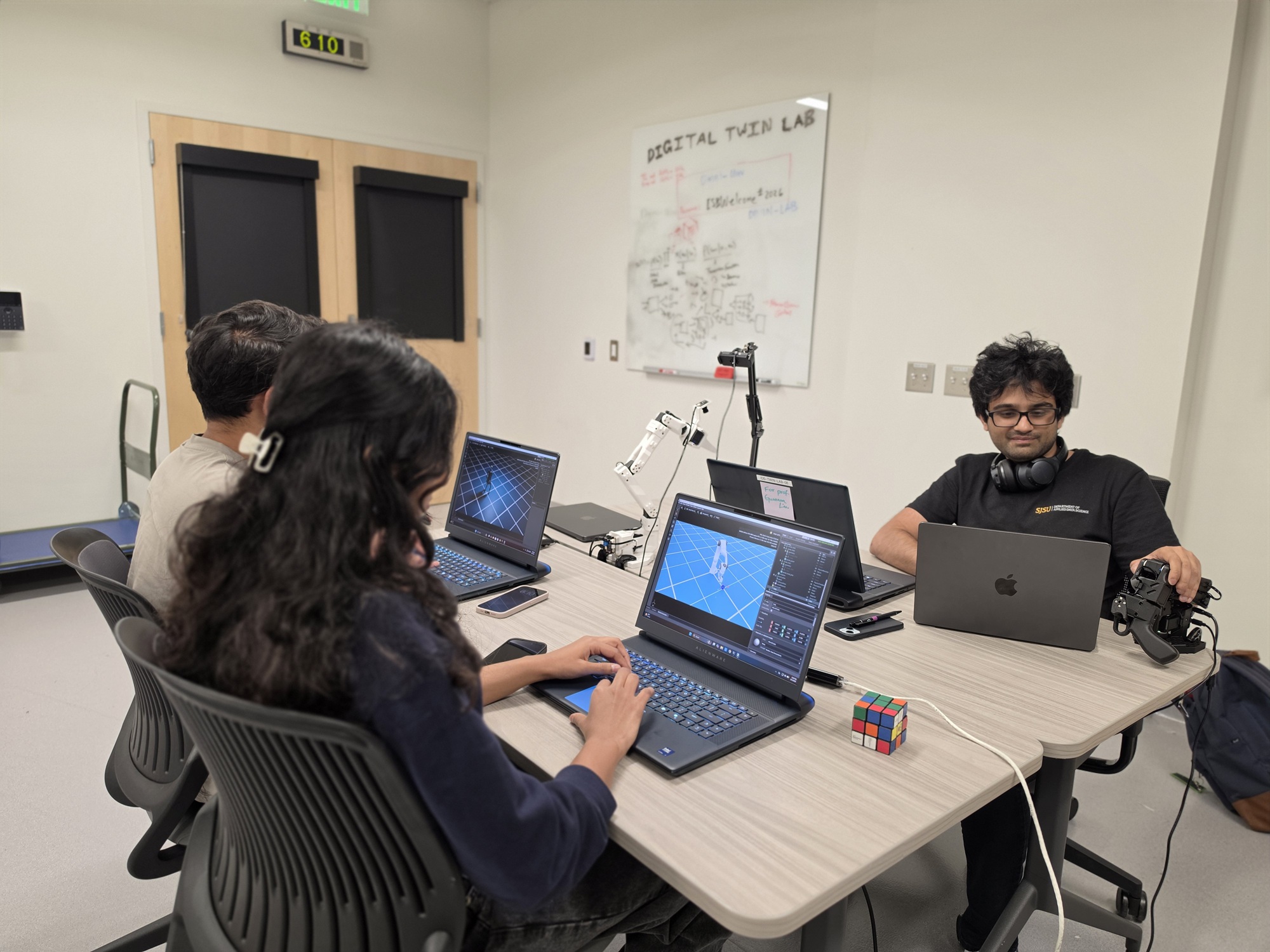 Students on laptops in DT Lab