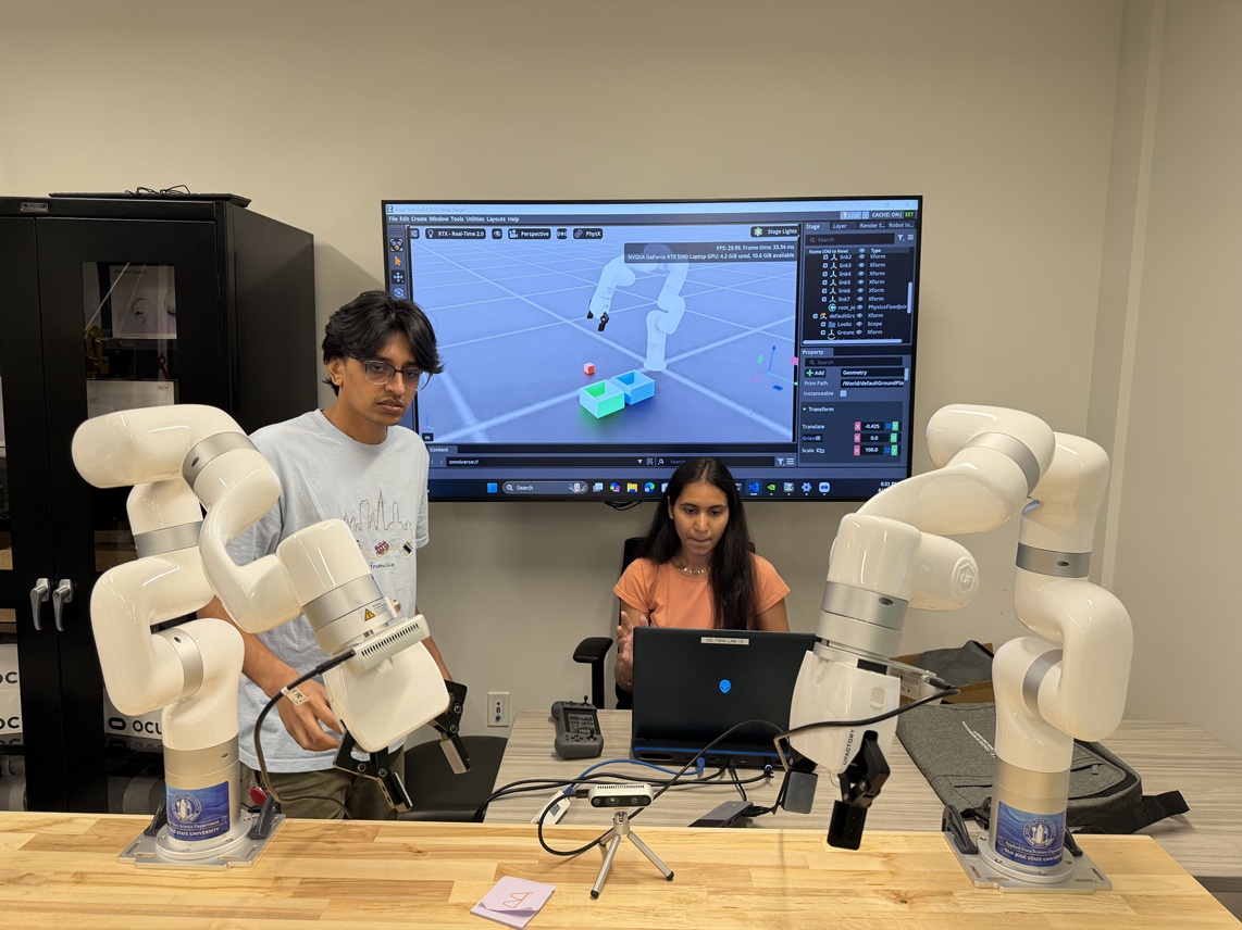 Twin Lab Robotic Arms and Students 