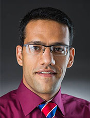 color headshot of Dr. Amir Armani