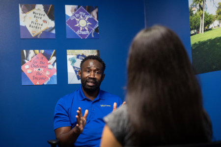 Case manager speaking with student