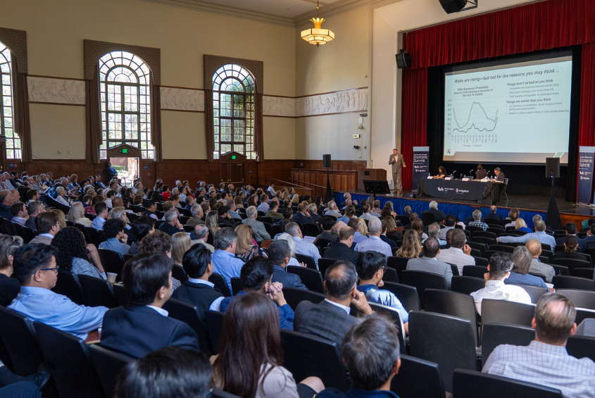Dr. Chris Thornberg delivers economic updates at the 2025 Economic Summit in Tower Hall.